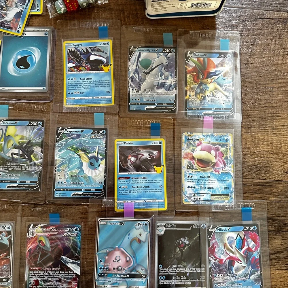 Pokemon Card Collection with Tins and Accessories 25 card Mystery Tin plus bonus